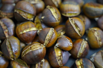 Roasted chestnuts are ready for sale hot.