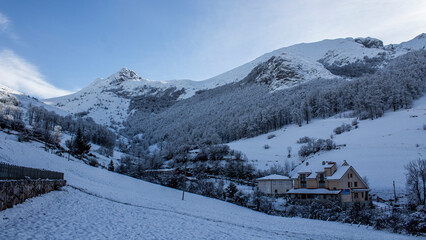 Fototapeta na wymiar Small village in a snowy mountain, Picos de Europa