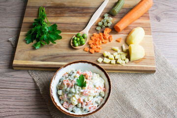 Russian traditional salad. Salad made of boiled vegetables and mayonnaise.