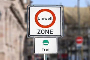 Road traffic sign marking a low emission zone in city centers in Germany translating as...