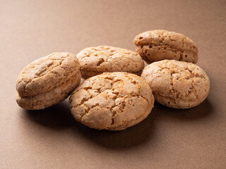 Delicious homemade nut cookies, in warm brown tones, close-up. Cookies in rustic style, background