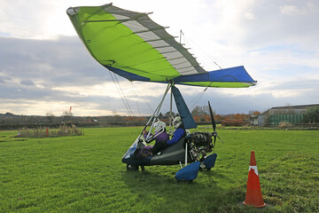Ultralight airplane in a landing field