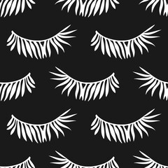 Tropical seamless pattern with palm leaves 