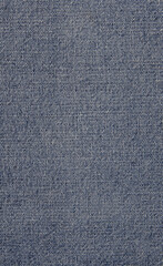 Denim texture in close up view with copy space for vintage background or wallpaper. Blue jeans pattern no seam with macro style to preset about classic fashion cloths concept. Indigo color fabric.