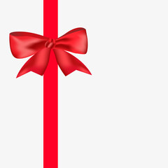 close up of a red ribbon bow on white background