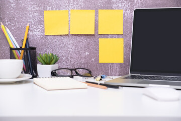 Yellow post note paper, memo paper and laptop computer with coffee cup,. scheduled for job or short note for work concept, minimal office desk, copy space