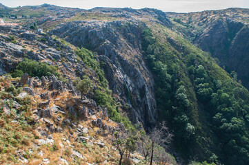 Fototapeta na wymiar Water fall in the mountains near Arouca, Portugal.