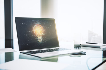 Creative idea concept with light bulb illustration on modern laptop screen. 3D Rendering