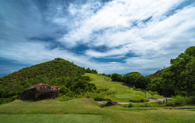 Tropical Golf course hole nr. 17 and fairway nr. 14 Lemuria Praslin Seychelles 