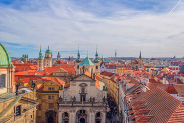 Fototapeta na wymiar View of the roofs of Prague houses from the Old Town Bridge Tower, Prague, Czech Republic