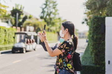 Woman with protective mask video call real estate agent.