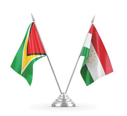 Tajikistan and Guyana table flags isolated on white 3D rendering