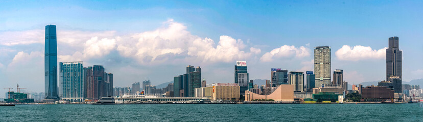 The skyline of West Kowloon and Tsim Sha Tsui on the waterfront with Victoria Harbour -  Hong Kong.