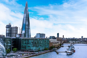 A view westward across the River Thames from Tower Bridge, London, UK towards the Shard
