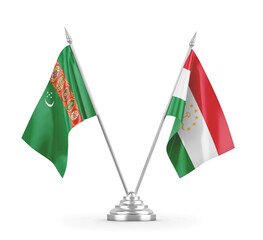 Tajikistan and Turkmenistan table flags isolated on white 3D rendering