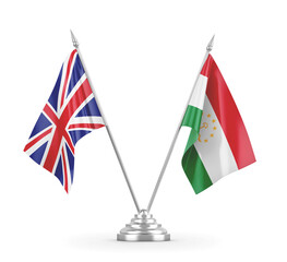 Tajikistan and United Kingdom table flags isolated on white 3D rendering