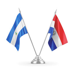 Paraguay and Nicaragua table flags isolated on white 3D rendering