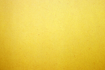 Yellow paper or cardboard texture for background.