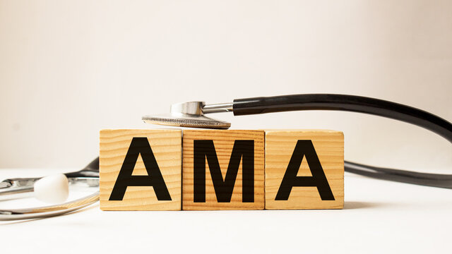 wooden cubes with text AMA . the medicine. medical concept
