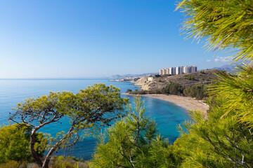 Natural park and residential complex against the sea in La Cala de Fenistrat, Benidorm, Spain.