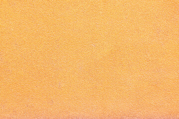 Fototapeta premium grainy golden yellow surface slightly textured
