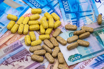 Pills and Money. Ruble bills and tablets.