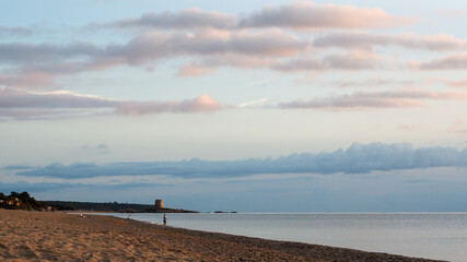fishing at sunrise by the sea