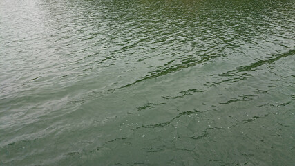 Looking at the surface of a large and beautiful mountain lake