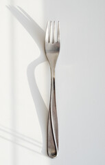 Fork on a white background with a shadow