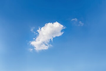 Fluffy white cloud on the sky background