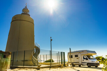 Caravan on spanish coast near lighthouse Carbonera