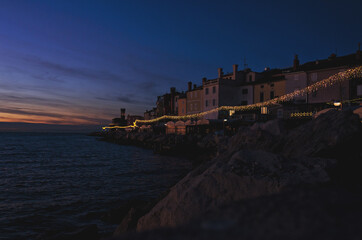 Fototapeta premium Old town of city at the Adriatic coast in winter, Piran, Slovenia. 14.12.2020.