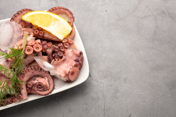 Fresh octopus salad with lemon and dill