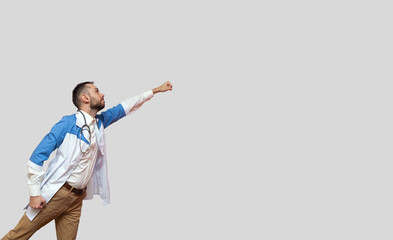 doctor superhero flying like a superman and fighting disease isolated on white background.