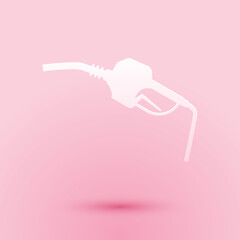 Paper cut Gasoline pump nozzle icon isolated on pink background. Fuel pump petrol station. Refuel service sign. Gas station icon. Paper art style. Vector.