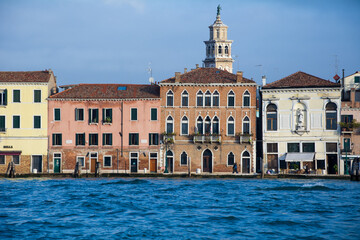 Fototapeta na wymiar Venice canal and traditional colorful Venetian houses view. Classical Venice skyline. Venice, Italy