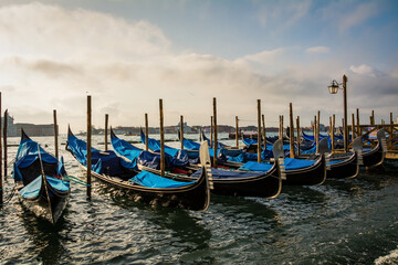 Gondolas moored outside St. Mark’s Square in Venice Italy
