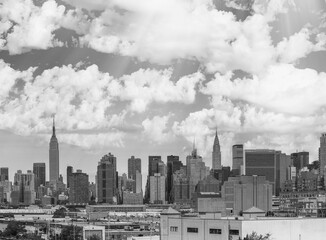 Black and white panoramic aerial view of New York City skyline. Manhattan skyscrapers from rooftop