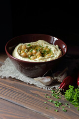 Hummus - chickpea traditional jewish and lebanese cuisine dish, flat lay, closeup, humus is a vegan and vegetarian healthy legume food