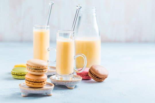 Assorted delicious French macarons with egg liqueur or eggnog