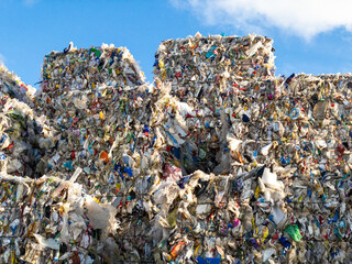 Compressed piles of garbage and plastic waste - pollution from our trash