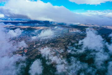 Alpine village, city view cloud, drone flight. Bulgaria, Bansko.