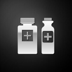 Obraz premium Silver Medicine bottle icon isolated on black background. Bottle pill sign. Pharmacy design. Long shadow style. Vector.