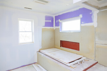 Master Bathroom with new under construction bathroom interior drywall ready for tile