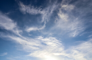 Stunning cirrus cloud formation panorama in a deep blue sky