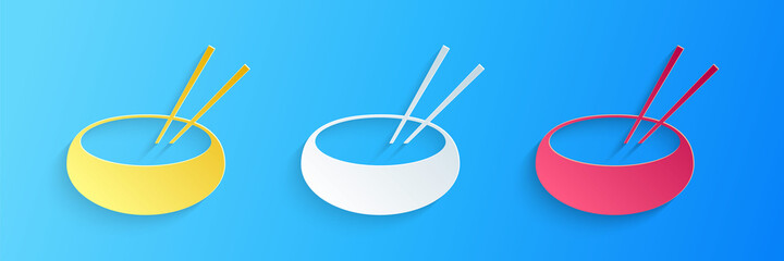 Paper cut Bowl with asian food and pair of chopsticks silhouette icon isolated on blue background. Concept of prepare, eastern diet. Paper art style. Vector.
