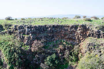 landscapes with mountain views with the remains of ancient buildings on the Golan heights in israel