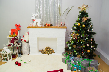 New Year's interior, a beautiful photo zone with a Christmas tree, fireplace and gifts