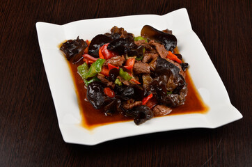 beef stew with stewed peppers and mushrooms in sauce