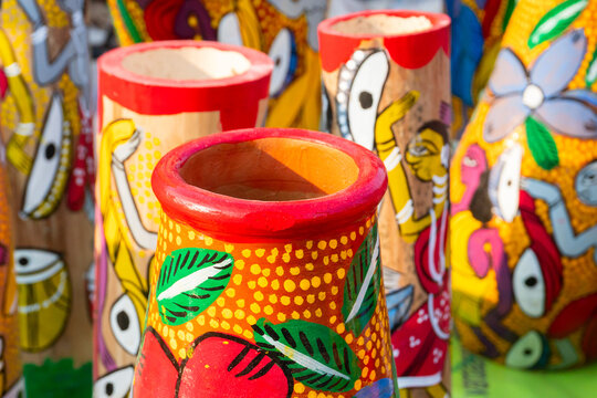 Beautiful painted colorful terracotta pots, works of handicraft, for sale during Handicraft Fair in Kolkata.